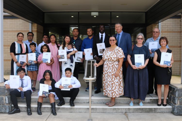 group of new citizens standing on the steps of Goondiwindi Regional Council 4 McLean Street office