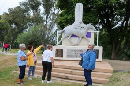 group of tourists at gunsynd statue goondiwindi